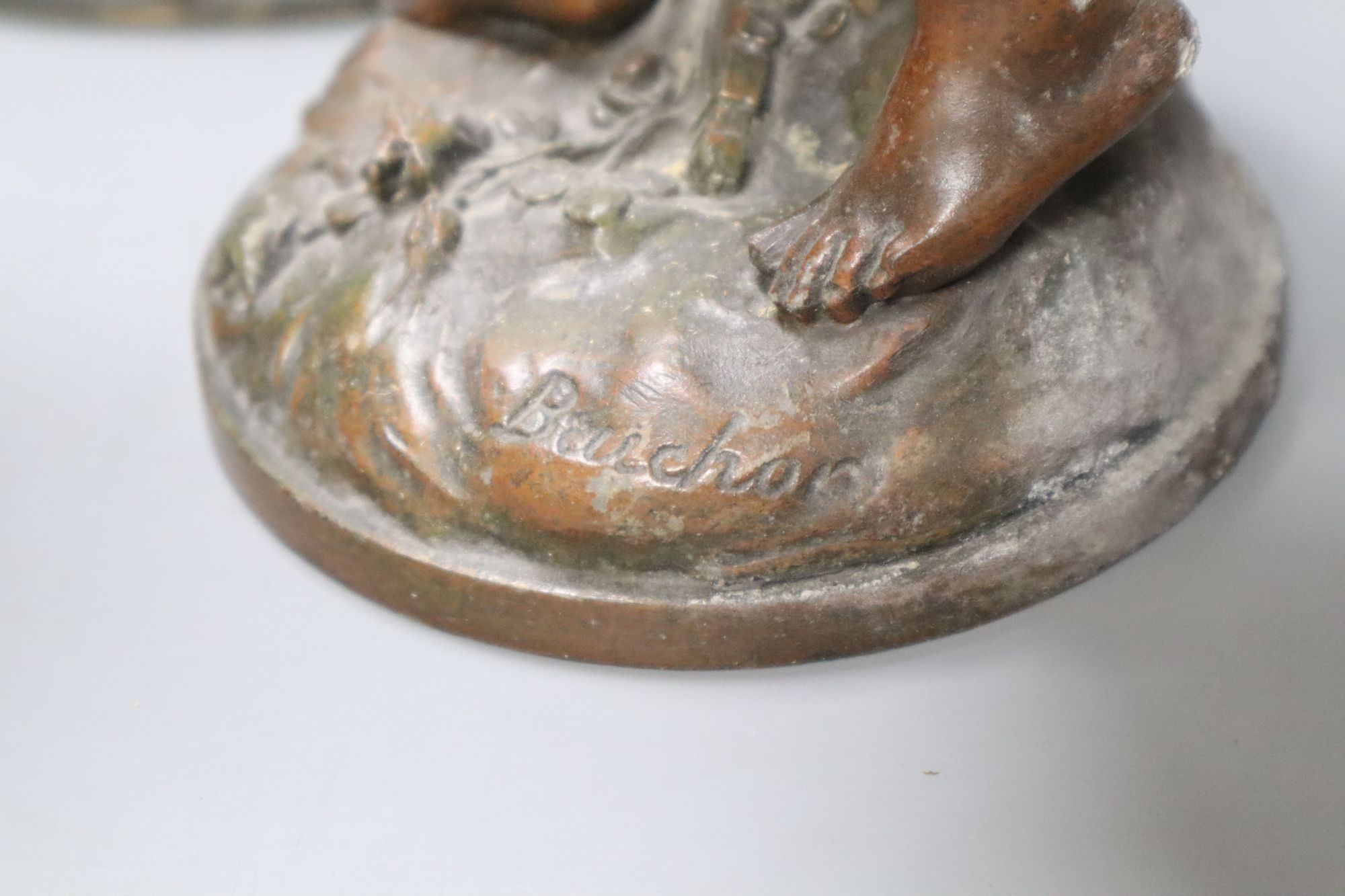 A pair of spelter cherubs, after Bruchon, and another spelter figure, height 74cm